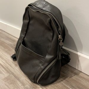 Black Leather Lucky Brand backpack and wristlet